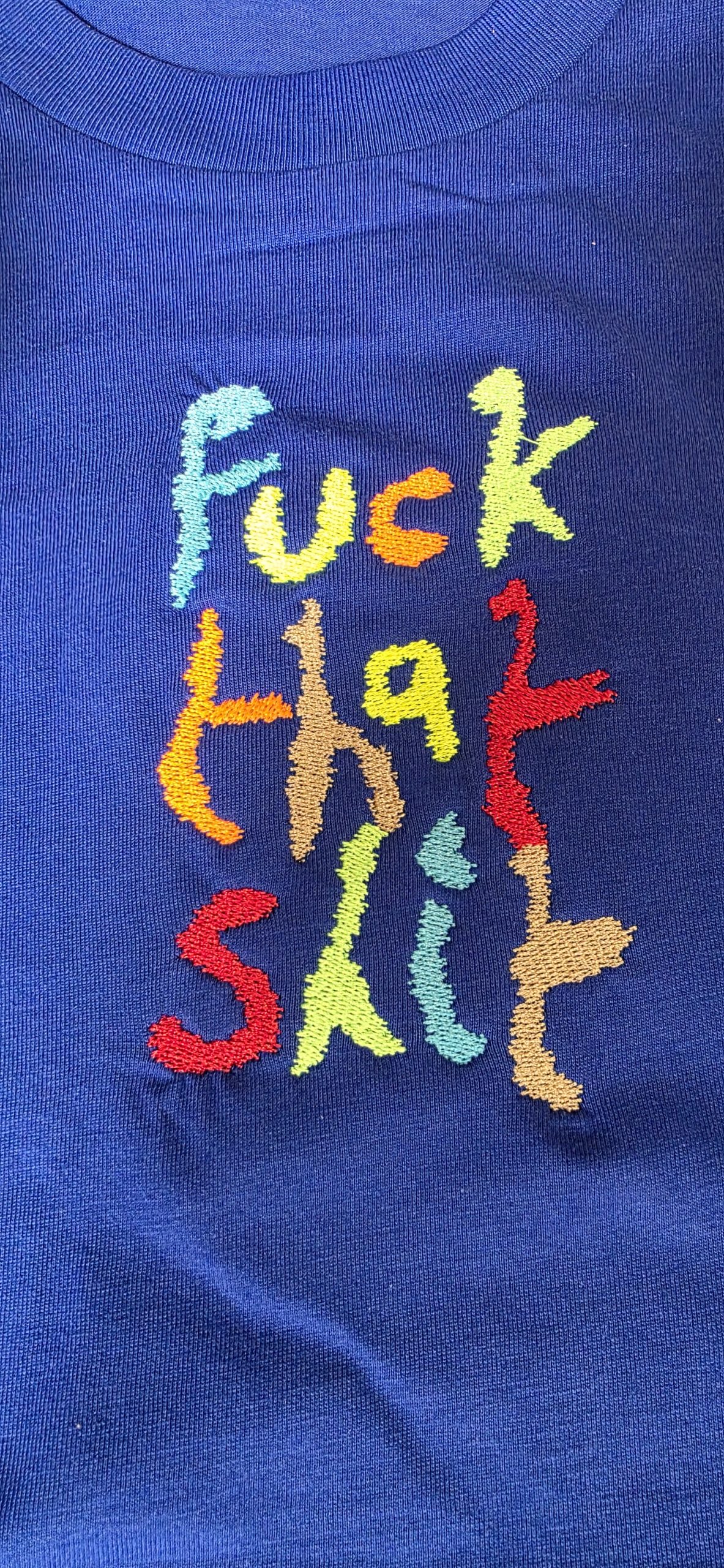 Embroidery detail Threads on Left Chest side: Red, Light Brown, Neon Green, Aqua, Neon Yellow, Neon Orange